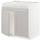 A white METOD kitchen cabinet with light grey lerhyttan doors featuring beveled edges and a traditional design.