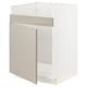 A white METOD kitchen cabinet with beige stensund fronts, featuring a single door and a wire shelf inside.