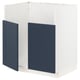 Extreme close-up of white METOD kitchen unit with blue doors, sleek design, two doors open, modern style.