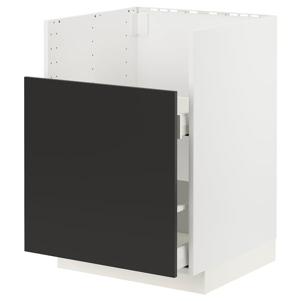 A modern kitchen cabinet in white with a black door.