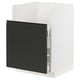 Modular kitchen cabinet in black and white, modern design with integrated handle.