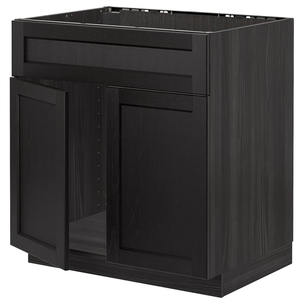 Black kitchen cabinet with shrimp-shaped design and dark stained wood finish.