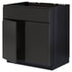 Black METOD kitchen cabinet, dark wood finish, rectangular, glossy edges.