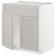 A white METOD kitchen cabinet with a traditional design, featuring beveled edges and a sturdy frame.