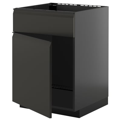 Black METOD kitchen cabinet with glossy, handleless design.