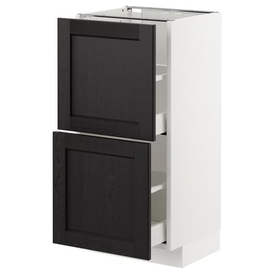 White METOD kitchen unit with black stained wooden drawers and beveled edges.