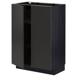 Black METOD cabinet, modern design, rectangular shape, with one open door.