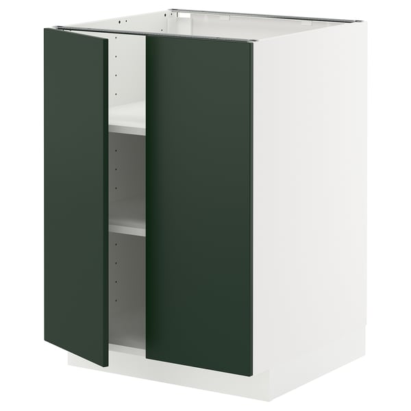 A white and green kitchen cabinet from the METOD system. It two green doors and a white frame with adjustable shelves.