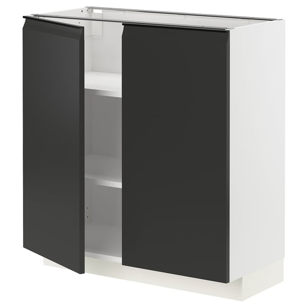 METOD kitchen cabinet in white with matte black doors and integrated handles.