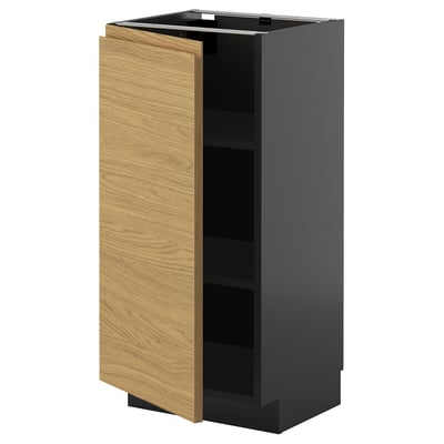 A modern kitchen cabinet named METOD with a light brown wooden door and a dark gray base. It has a minimalist design with integrated handles.