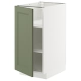 A METOD kitchen cabinet with a grey-green axstad door, featuring a rectangular and minimalist design.