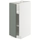 A white METOD kitchen cabinet with a single door in matt grey-green. Its modern design a sturdy frame and adjustable shelves.