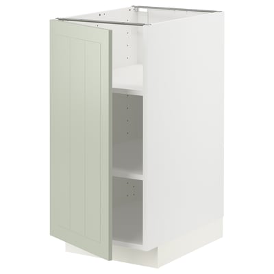 A white METOD kitchen cabinet with a green stensund door, rectangular with a flat surface and panel design.