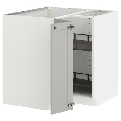 White METOD kitchen cabinet with shelves open for organization.