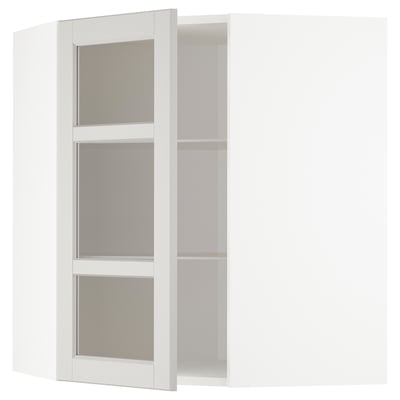 White METOD kitchen cabinet with three adjustable shelves and frosted glass doors.