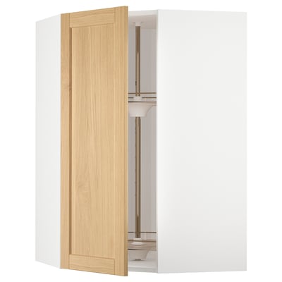 An open METOD kitchen cabinet with a light wood door. The cabinet is white with a modern design and glass shelves.