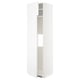 A white METOD kitchen cabinet with a modern design. It multiple adjustable shelves and reversible doors.