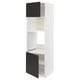 A white METOD kitchen cabinet with two black doors, one open, featuring shelves inside.