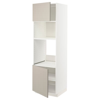 A tall white METOD kitchen cabinet with beige stensund doors, featuring adjustable shelves and a clean, modern design.