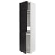 A modern, tall METOD kitchen cabinet in white with black upplöv doors, featuring a sleek, minimalist design.