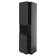 Dark gray METOD storage cabinet with minimalist matte handles, three shelves, sleek design.