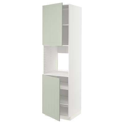 Ikea METOD kitchen cabinet in green with two open doors and shelves.