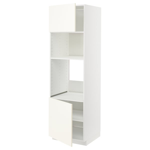 White METOD kitchen unit with open door, adjustable shelf.
