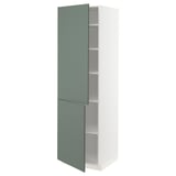 A METOD kitchen cabinet with a tall, rectangular white frame and green doors, featuring a modern design and adjustable shelves.