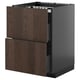 Dark wood METOD kitchen cabinet with slow-close drawers.