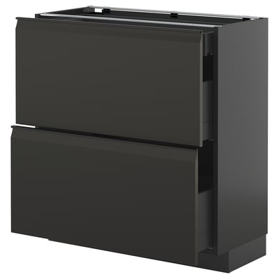 Modern black kitchen cabinet set with clean lines and integrated handles.