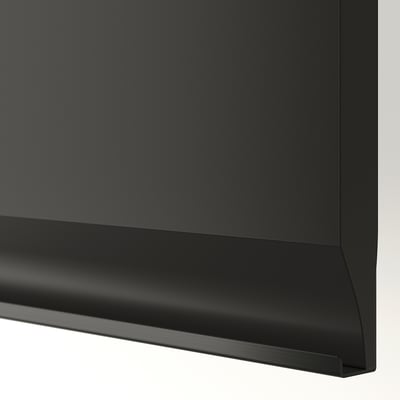 Matte black kitchen cabinet with sleek handle, smooth finish.