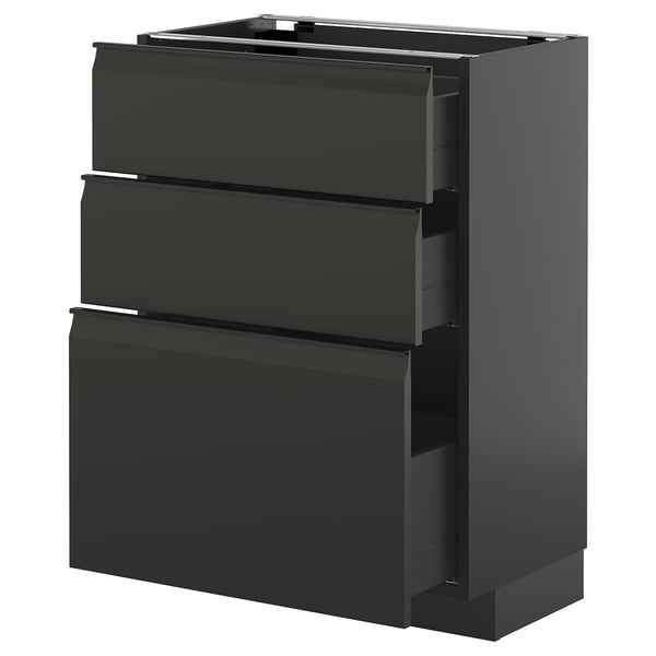 Dark gray kitchen cabinet with 3 open drawers.
