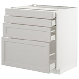 This image shows a white METOD kitchen cabinet with multiple light grey drawers, featuring bevelled edges and self-closing mechanisms.