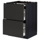 Black METOD kitchen cabinet with two open drawers, sleek and modern design.