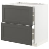 Dark grey IKEA METOD kitchen cabinet with two open drawers in white frame.