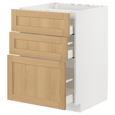 White METOD kitchen base with oak-veneer drawers and cabinet.