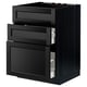 A black METOD kitchen cabinet with two open drawers and a door, featuring a traditional bevelled edge design.