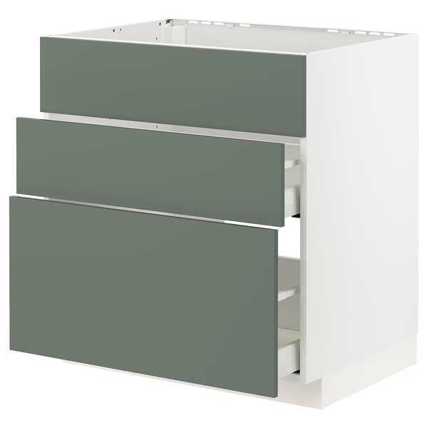 Modern IKEA METOD kitchen cabinet with grey-green fronts and three drawers.