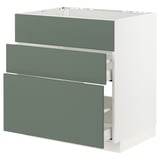 Modern IKEA METOD kitchen cabinet with grey-green fronts and three drawers.