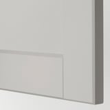 Close-up of modern kitchen drawer with sleek, smooth light grey finish and beveled edges.