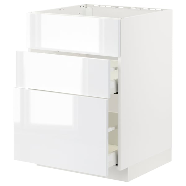 White METOD kitchen cabinet with high gloss finish and smooth drawers.