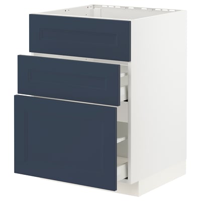 A white METOD kitchen unit with three navy blue drawers and doors, featuring a sleek modern design.