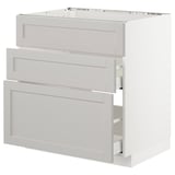 White METOD kitchen unit. Three light grey drawers, bevelled edges. Modern, minimalist design.