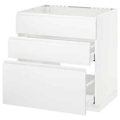 White METOD kitchen unit with three open drawers, sleek minimalist design.