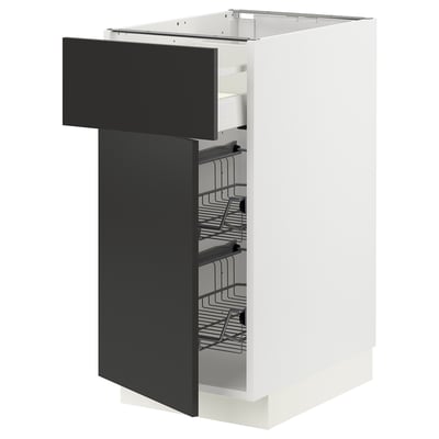 White METOD kitchen cabinet with black nichebo drawer, multiple wire racks, modern design.