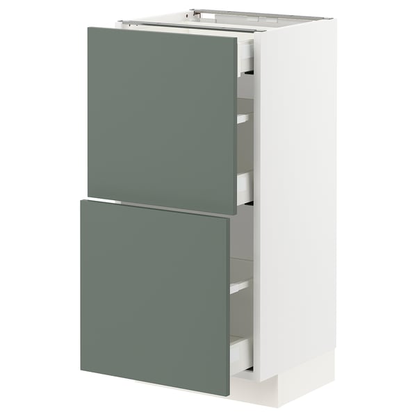 An IKEA METOD kitchen cabinet with grey-green bodarp fronts, offering a modern, sleek design with two drawers and a door.