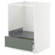 A white METOD kitchen cabinet with a grey-green drawer.