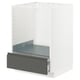 White METOD kitchen cabinet with dark grey drawer, partial open.