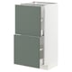 A modern white METOD kitchen unit with two grey-green drawers. The unit a sleek design and sturdy construction.