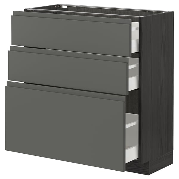 Modern dark grey kitchen cabinet with multiple drawers.